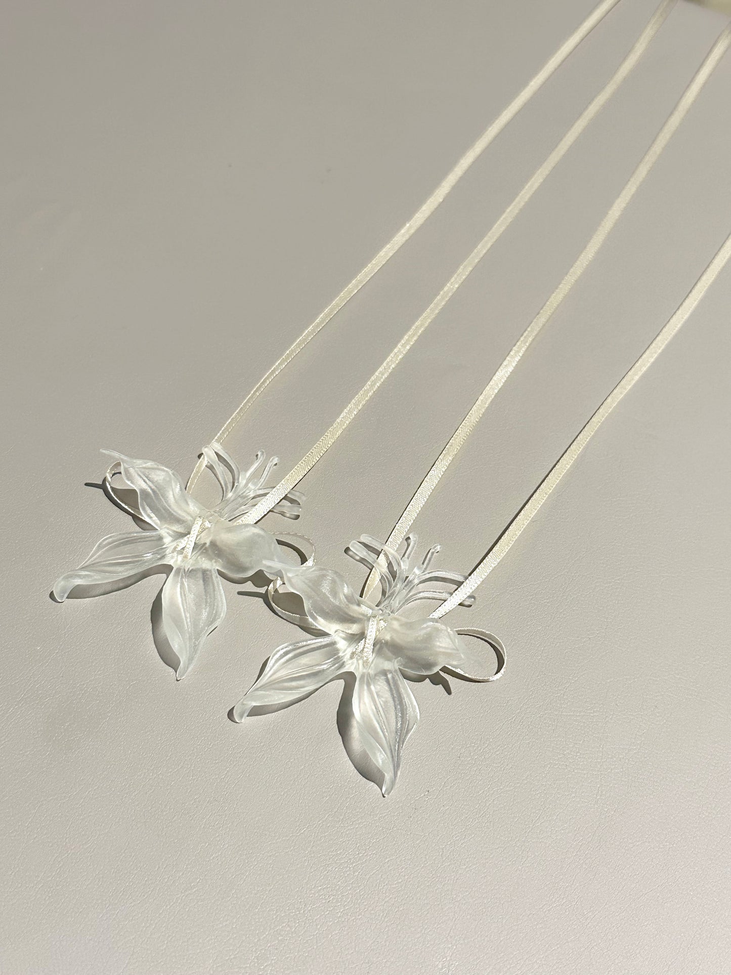 Clear Orchid Whispers Earrings Ribbon