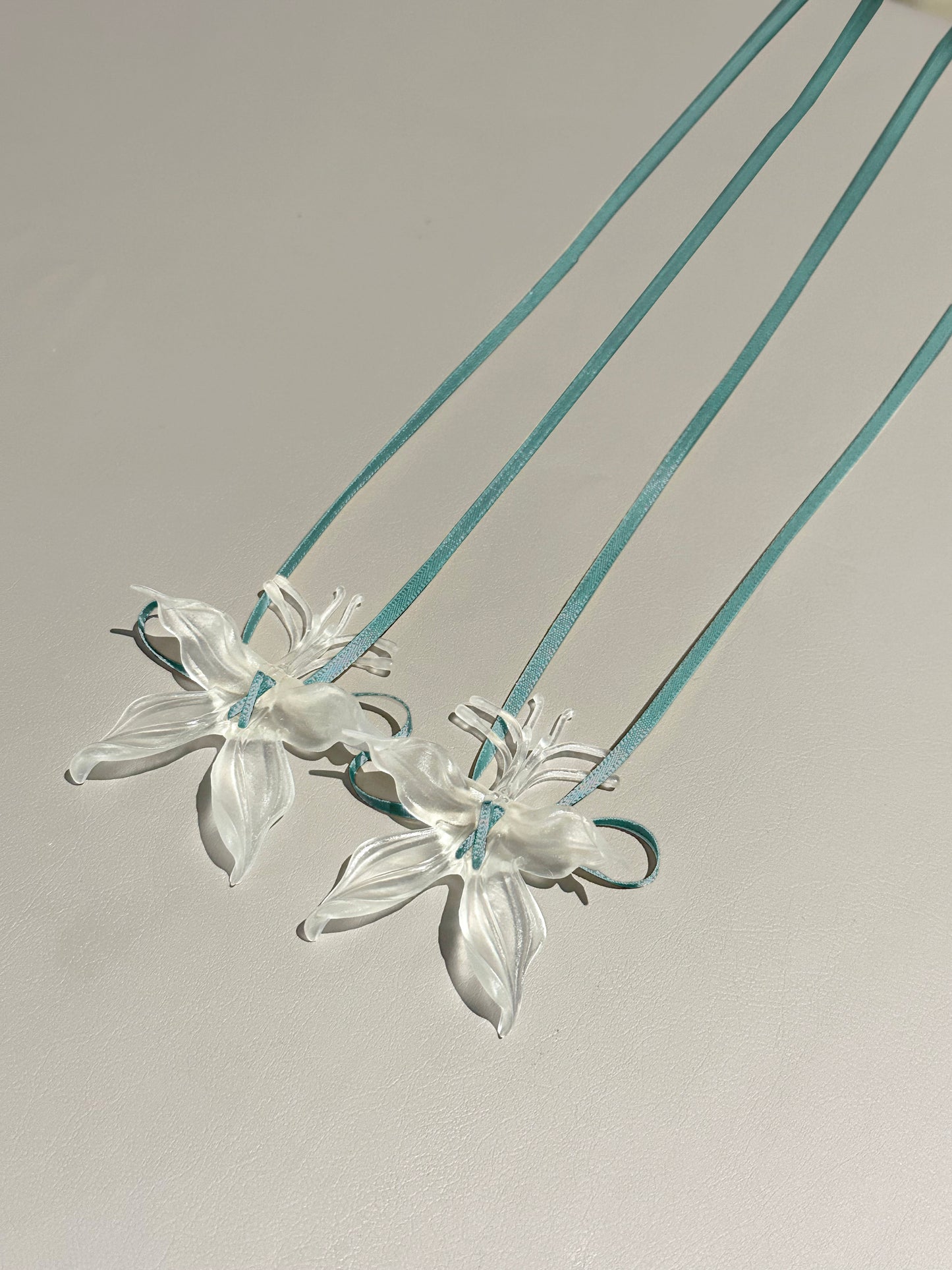 Clear Orchid Whispers Earrings Ribbon